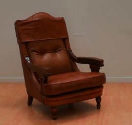 Appraisal: A French leather gentleman's chair th century together with another