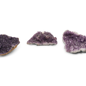 Appraisal: Three Amethyst Geode Specimens Length of largest example x width