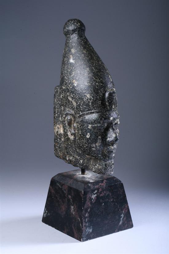 Appraisal: EGYPTIAN BLACK GRANITE HEAD OF OSIRIS Wearing the crown of