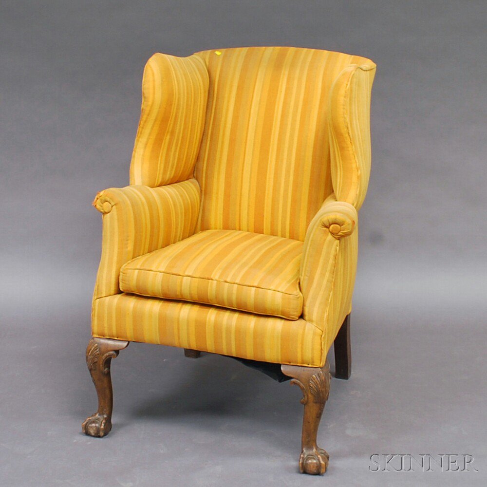 Appraisal: Chippendale-style Carved Mahogany Wing Chair with shell-carved knees and C-scroll