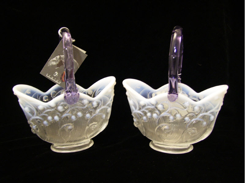 Appraisal: Pair Fenton Opalescent Baskets Two opalescent Fenton baskets with a