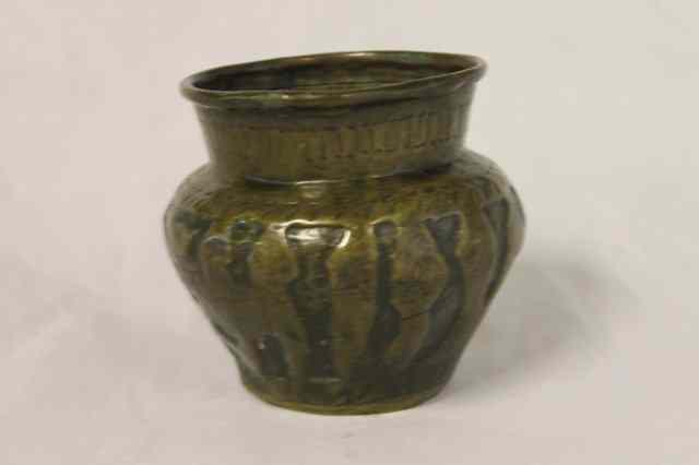 Appraisal: AN ISLAMIC EMBOSSED BRASS SMALL VASE with script to exterior