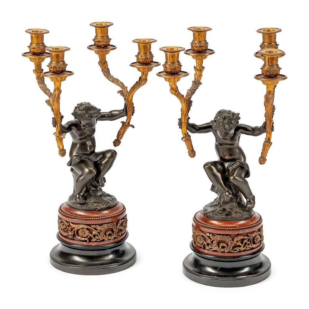 Appraisal: A Pair of French Parcel-Gilt and Patinated Bronze Four-Light Figural