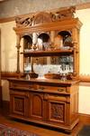 Appraisal: SIDEBOARD - Masterly carved golden oak two part sideboard The