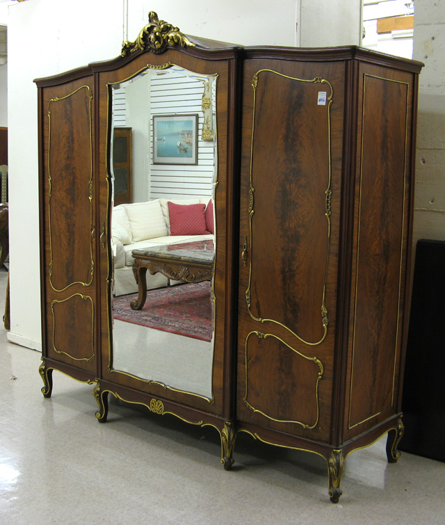 Appraisal: LOUIS XV STYLE THREE-DOOR ARMOIRE French mid- th century of