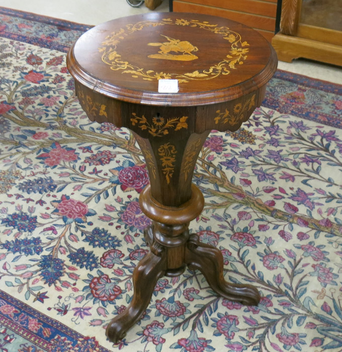 Appraisal: A VICTORIAN MARQUETRY INLAID ROSEWOOD SEWING TABLE American th century