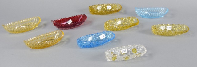 Appraisal: Assortment of Nine Canoe-Shaped Relish DishesFive amber one dark blue