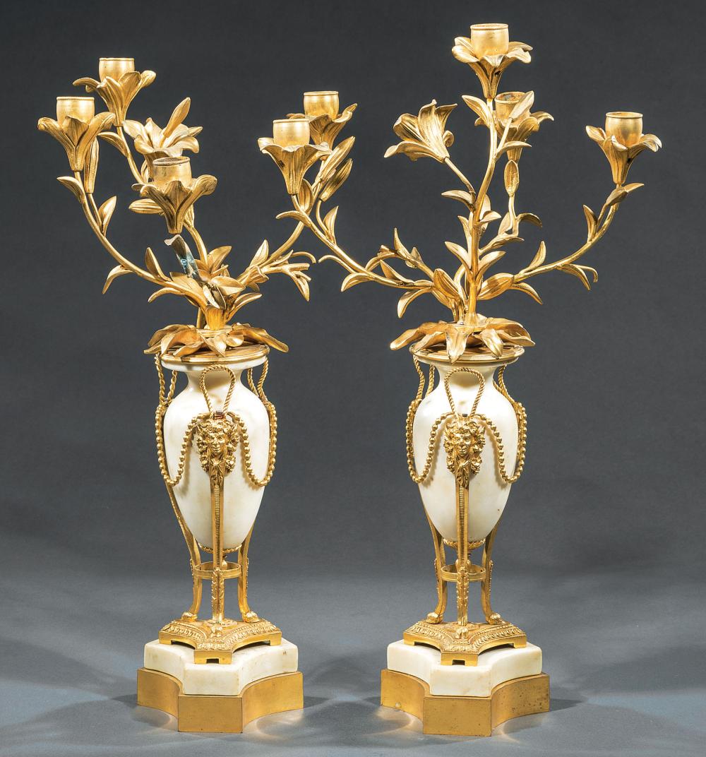 Appraisal: Pair of Louis XVI-Style Bronze and Marble Four-Light Candelabra early