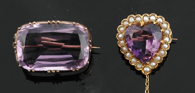 Appraisal: Two Edwardian amethyst brooches Comprising a heart shaped amethyst surrounded