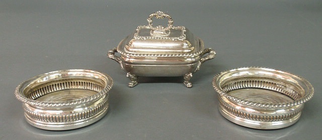 Appraisal: Pair of silverplate wine coasters dia and a silverplate vegetable