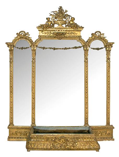 Appraisal: An imposing Napoleon III carved giltwood mirror and associated jardini