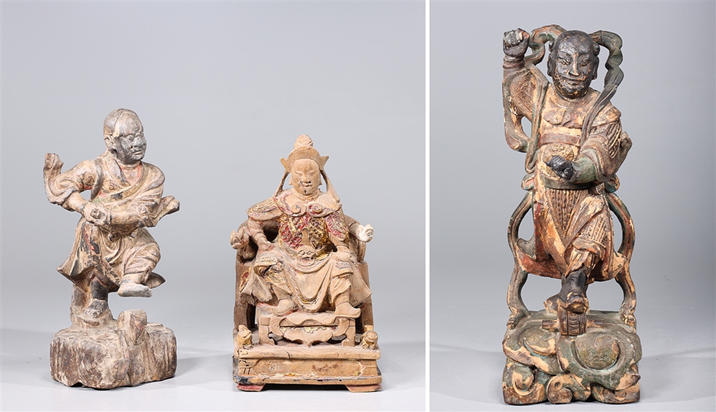 Appraisal: Group of three antique Japanese wood carvings commensurate wear and