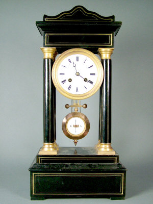 Appraisal: A late th century Continental portico clock the brass inlaid