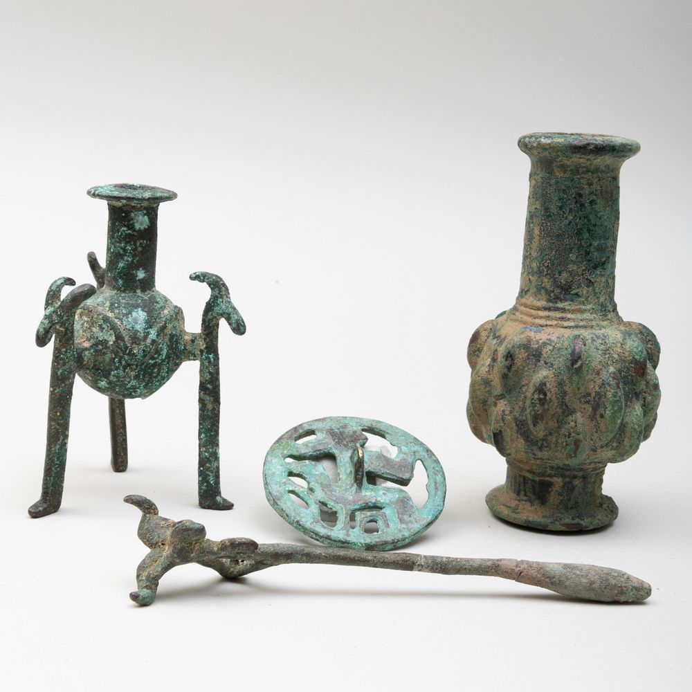 Appraisal: Group of Luristan Bronze Artifacts Comprising A mace head A