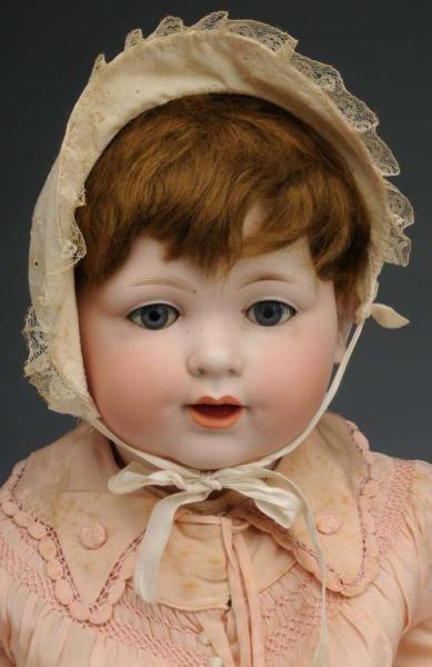 Appraisal: A M Character Baby Description Germany Ca Bisque socket head