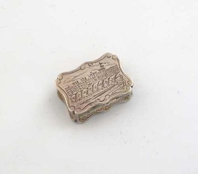 Appraisal: A small Victorian engraved 'castletop' vinaigrette shaped oblong with a