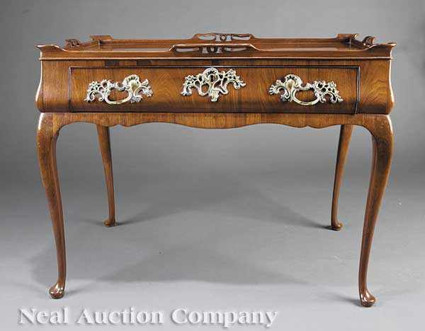 Appraisal: A Dutch Rococo Mahogany Tea Table th c galleried top