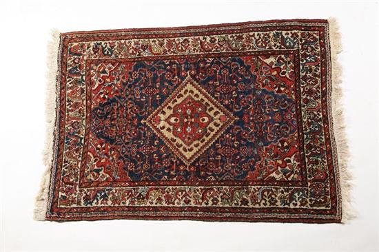 Appraisal: ORIENTAL RUG Injeles Red spandrels white border and blue ground