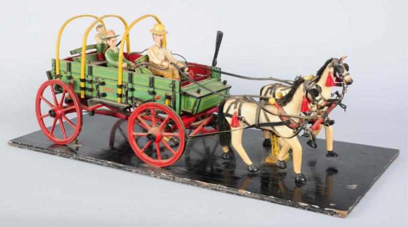 Appraisal: Wooden Folk Art Open Wagon With three people and two