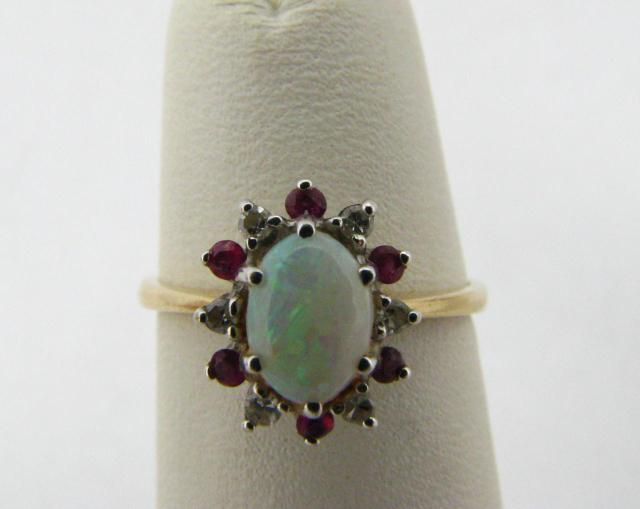 Appraisal: K Yellow Gold Opal Ring with Rubies and Diamonds