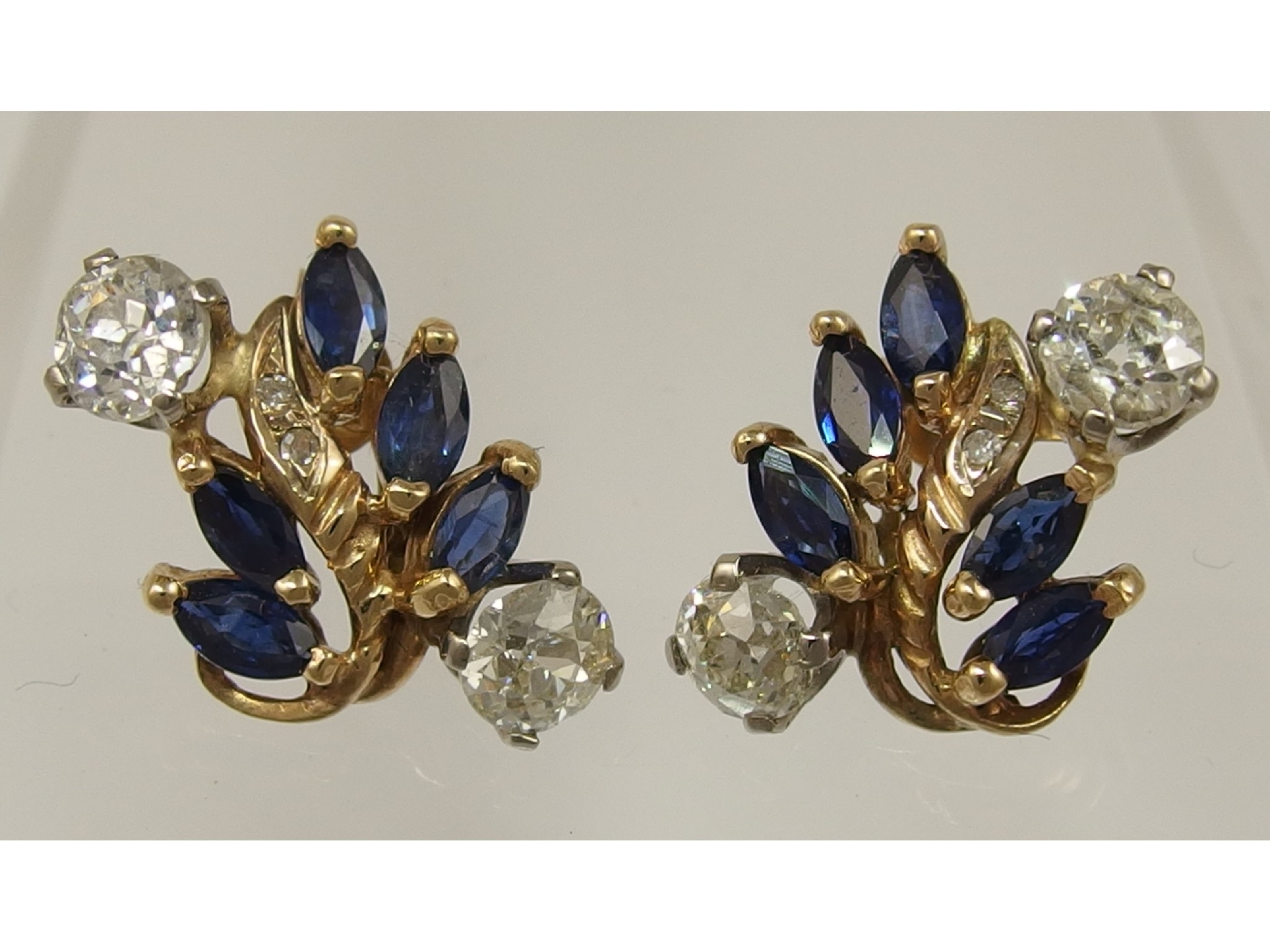 Appraisal: A pair of diamond and sapphire cluster earringsdiamond combined total