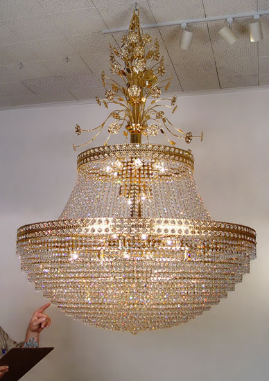 Appraisal: PALATIAL ft TALL SWAROVSKI CRYSTAL CHANDELIER lights under a wall