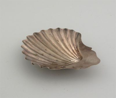 Appraisal: A George III shell butter dish on two cast winkle