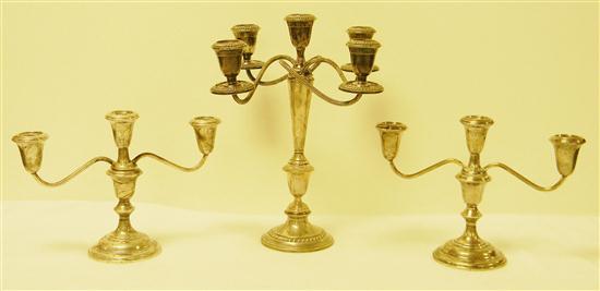 Appraisal: STERLING Three weighted sterling candelabra one pair S Kirk and