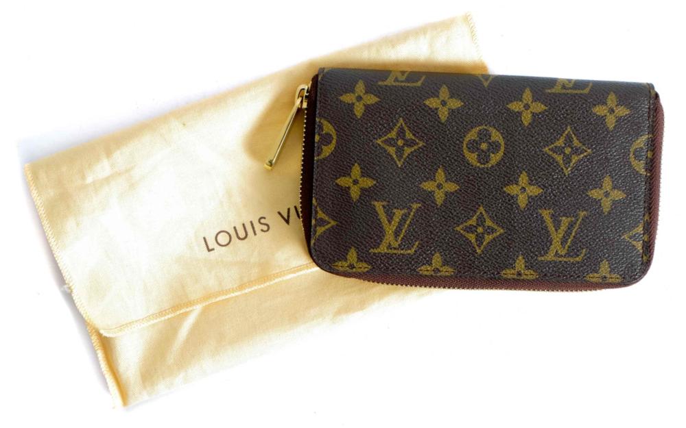 Appraisal: LOUIS VUITTON ZIPPY MONOGRAM CLUTCHLouis Vuitton Zippy clutch Monogram Leather