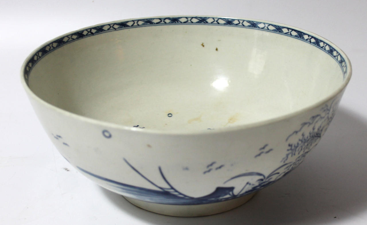 Appraisal: An thC Caughley blue and white porcelain punch bowl the