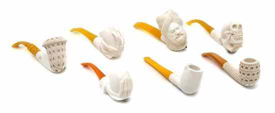 Appraisal: A Collection of Seven Meerschaum Pipes comprising a bust of