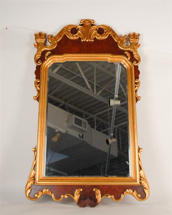 Appraisal: A Mahogany and Gilt Georgian-style Wall Mirror having a deep