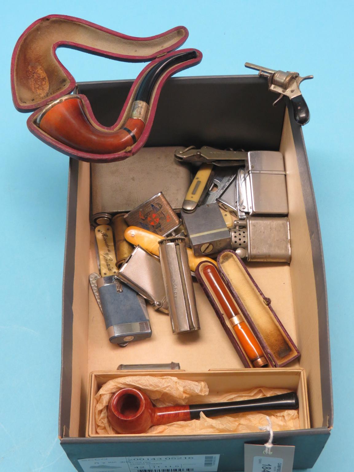 Appraisal: A gold-mounted cheroot holder silver-mounted meerschaum pipe both cased novelty