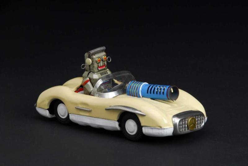 Appraisal: Robot in Mercedes Toy Description Japanese Made by ATC Working