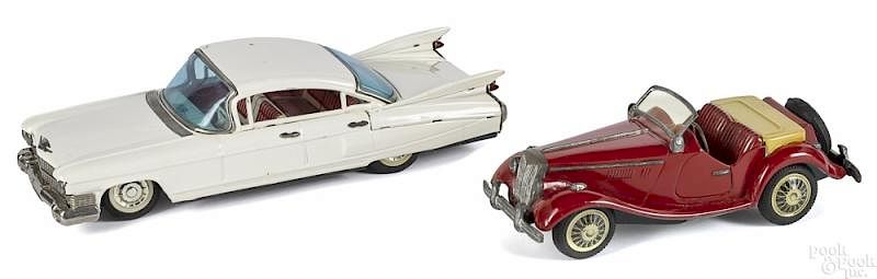 Appraisal: Two Bandai Japan tin friction cars Two Bandai Japan tin