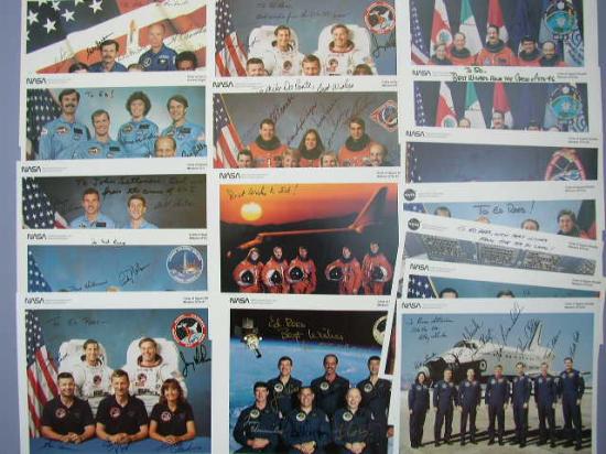 Appraisal: Shuttle Crews Complete Fourteen complete crew signed color lithographs for