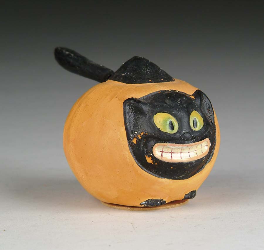 Appraisal: CAT FACED PUMPKIN CONTAINER Neat variation Showing pumpkin with cat