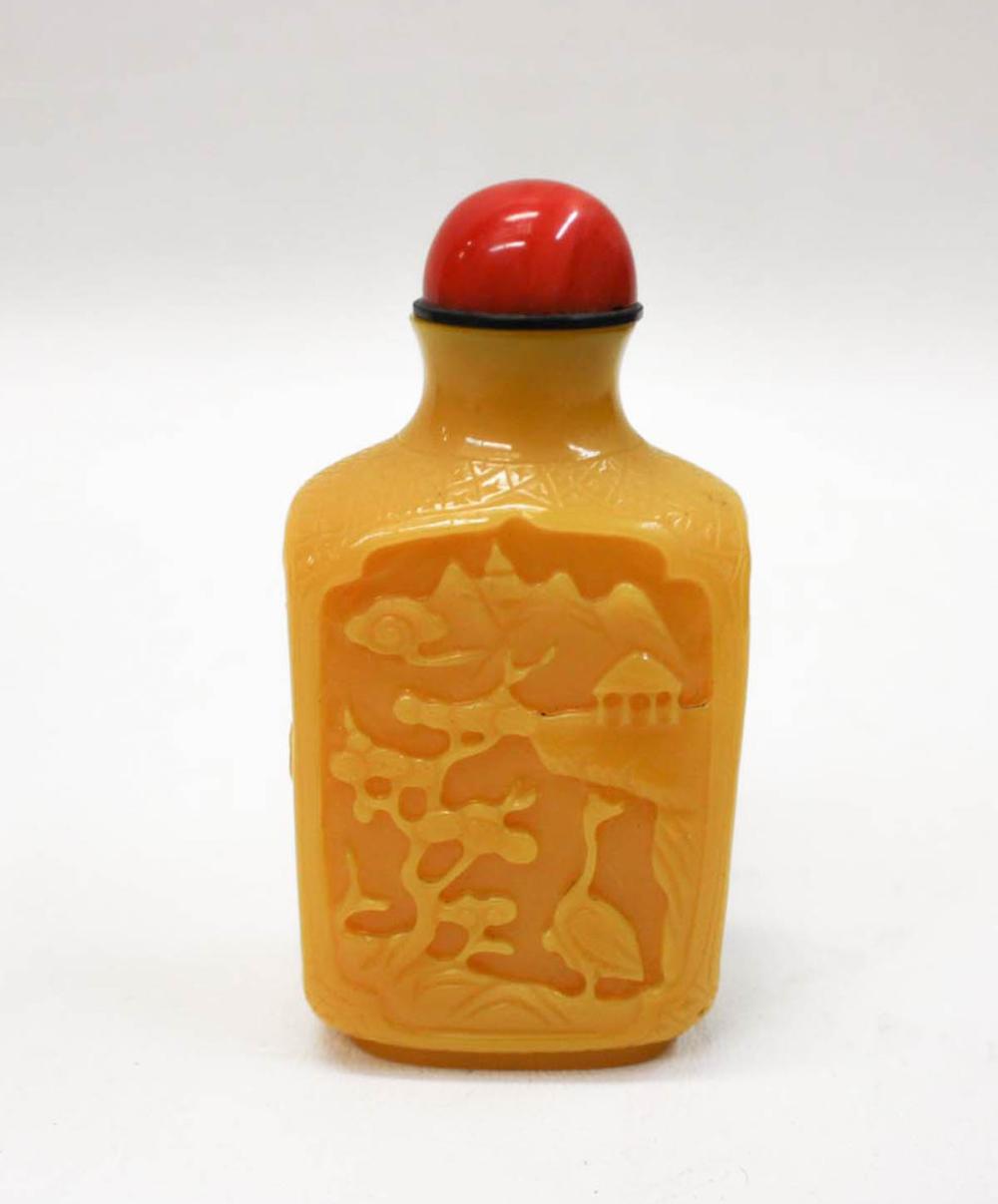 Appraisal: CHINESE PEKING GLASS SNUFF BOTTLE of rectangular form featuring relief