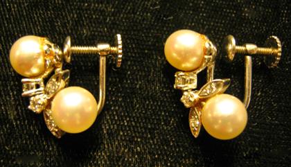 Appraisal: karat yellow gold pearl and diamond earringsComposed of two pearls