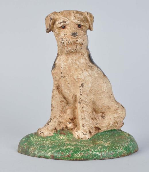 Appraisal: Cast Iron Sitting Wirehaired Terrier Dog Doorstop Made by Hubley