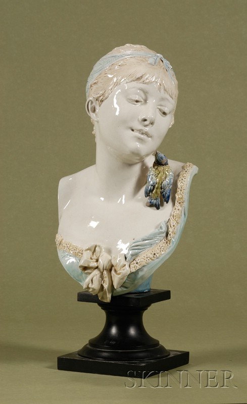 Appraisal: French Faience Bust of a Maiden with a Songbird Choisy-le-Roi