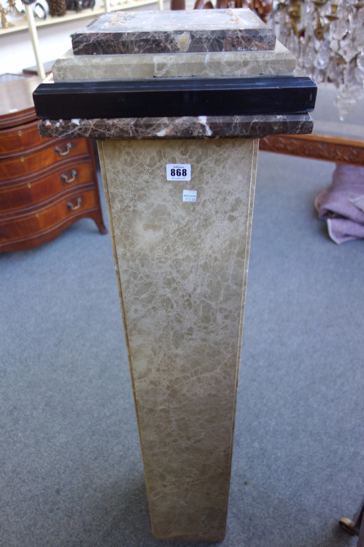 Appraisal: A pair of marble veneered columns th century of square