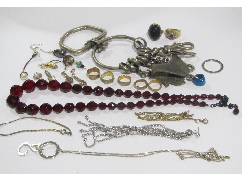 Appraisal: Lot comprising red faceted glass beads substantial white metal key