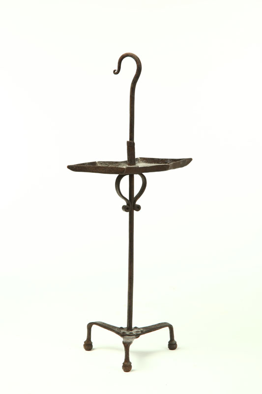 Appraisal: WROUGHT IRON GREASE LAMP American th century Open diamond pan