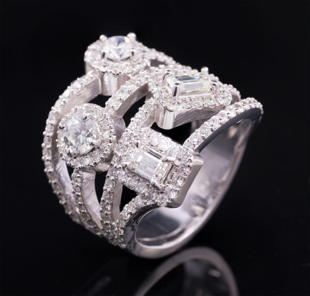 Appraisal: kt White Gold and Diamond Quadruple Band Ring set with