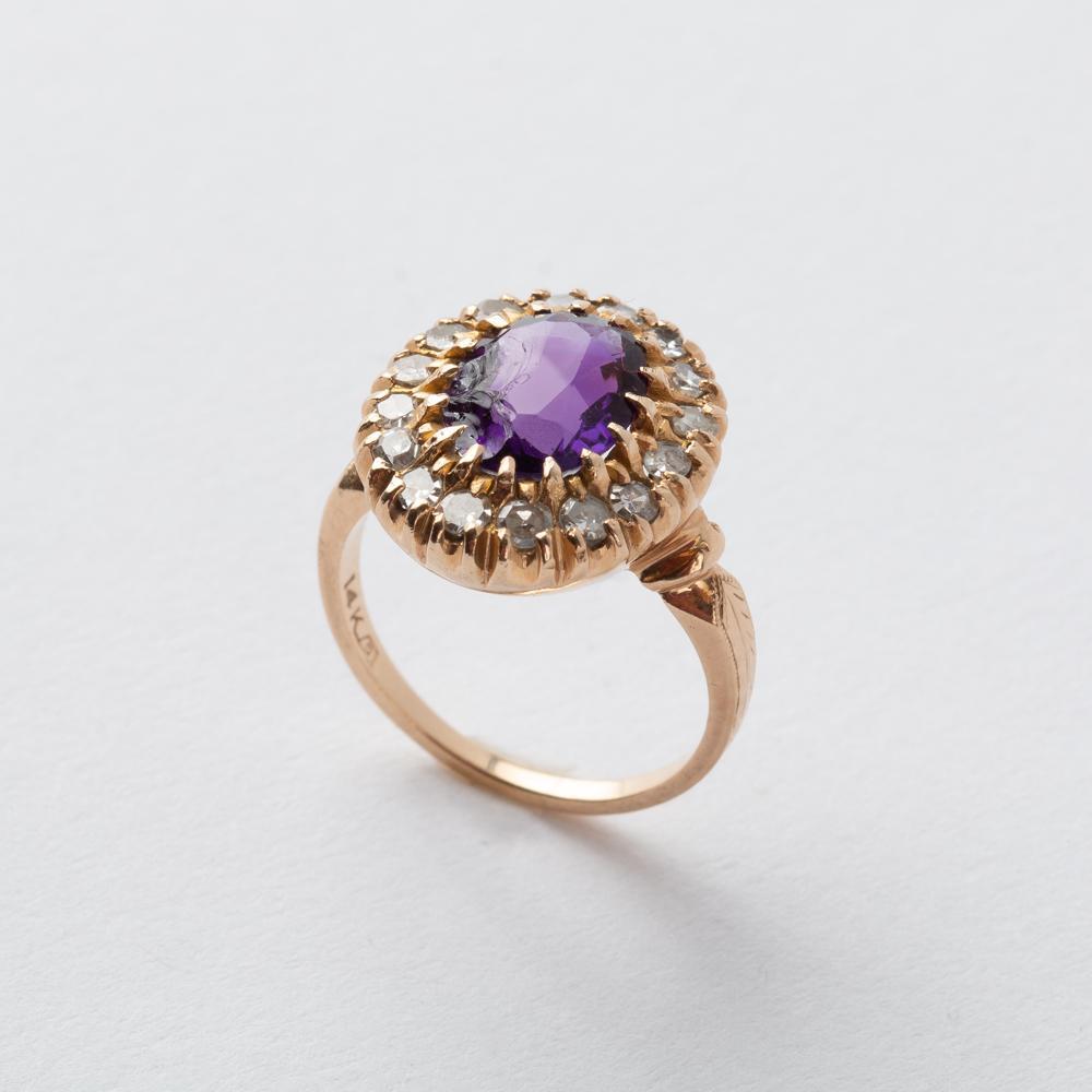 Appraisal: K AMETHYST DIAMOND HALO RING K yellow gold halo ring