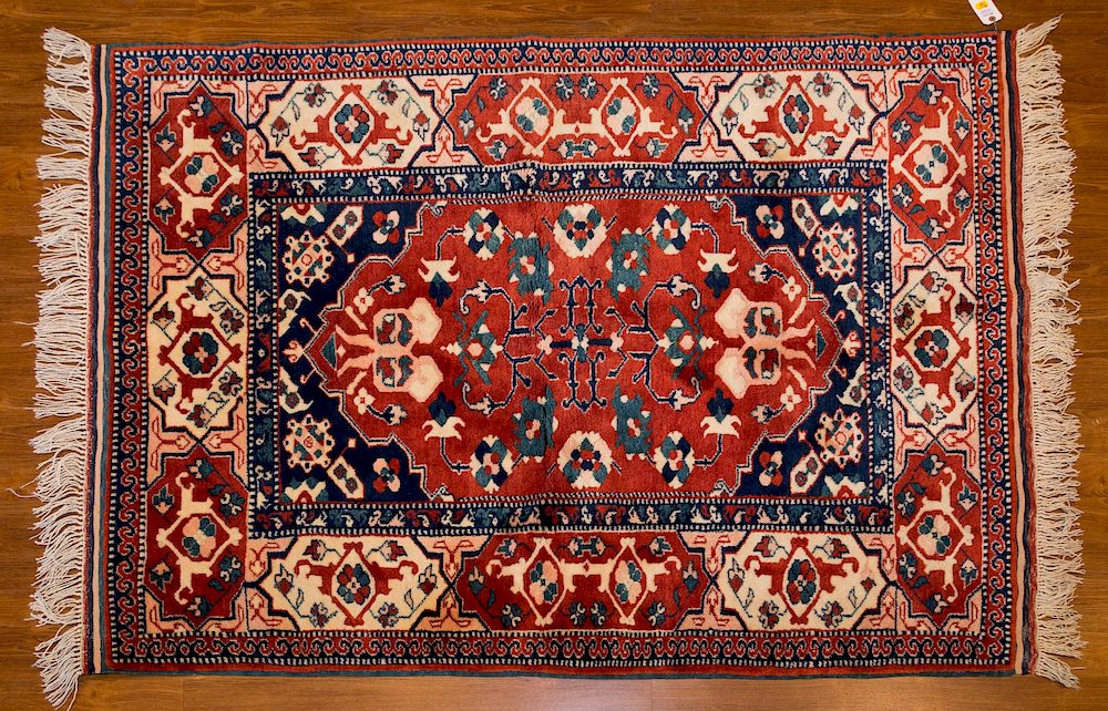 Appraisal: Turkish Konya Rug x hand knotted wool foundation Condition Appears