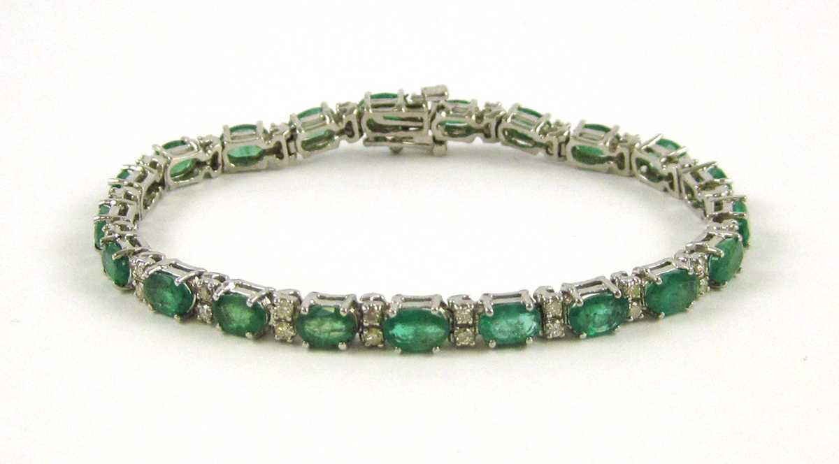 Appraisal: EMERALD DIAMOND AND FOURTEEN KARAT GOLD BRACELET The white gold