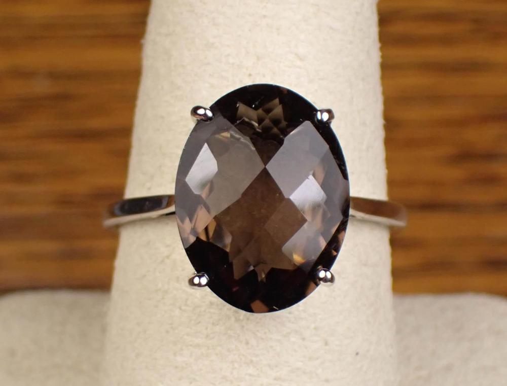 Appraisal: SMOKY QUARTZ AND WHITE GOLD SOLITAIRE RING The k white