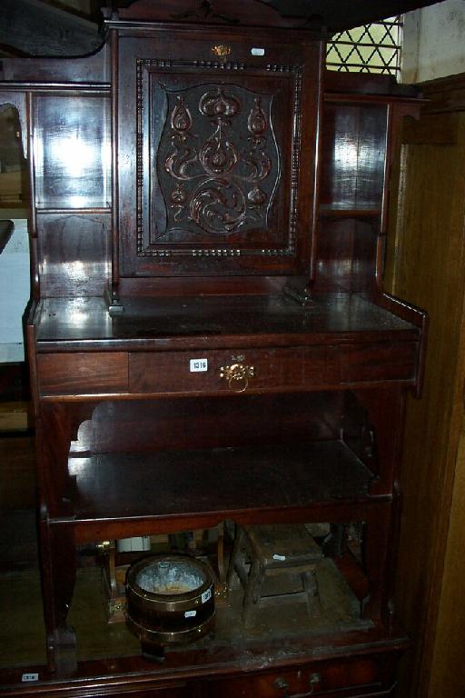 Appraisal: An Art Nouveau mahogany ladies writing desk the lower section